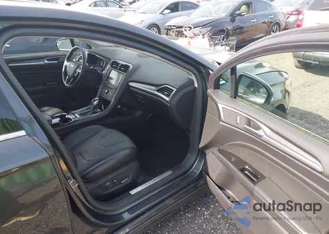 2016 Ford Fusion Hybrid Titanium from USA, damaged, VIN 3FA6P0RU8GR171770